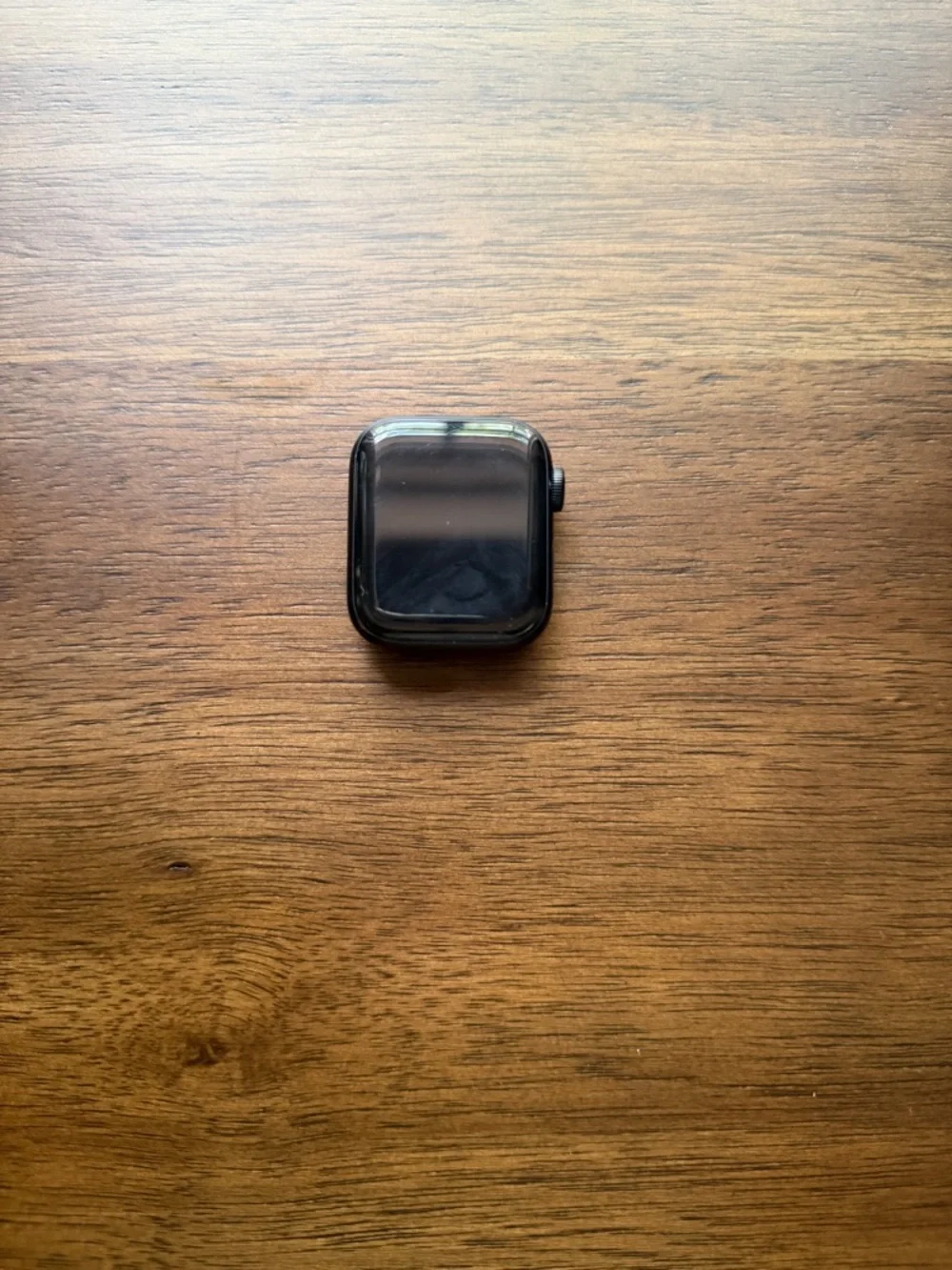 Apple Smartwatch with White Magnetic Charger - Black Watch Face